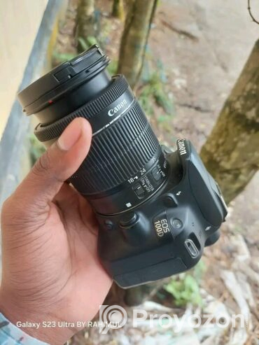 Canon 100D with 18-55 STM Lens..