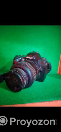 Nikon D70s Camera 18-55mm VR lens.